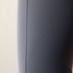 Close-up of high waist cropped yoga pants showing fabric texture and quality stitching.
