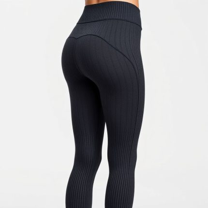 Charcoal ribbed flare leggings, high waisted gym leggings on white background, hyperrealistic 8k product photo.