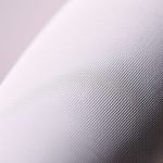 Close-up of the moisture-wicking fabric texture on flair leggings made from Lenzing Ecovero.