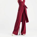 Burgundy wide leg yoga pants and a lululemon wrap top on a clean white background.