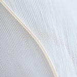 Close-up of the eco-friendly yoga pants on off fabric texture and stitching detail.